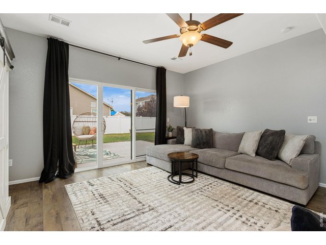 Property Photo 10 The sliding glass door opens directly to the patio creating an easy flow for entertainting.