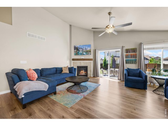 Property Photo 11 Family room is open with fireplace
