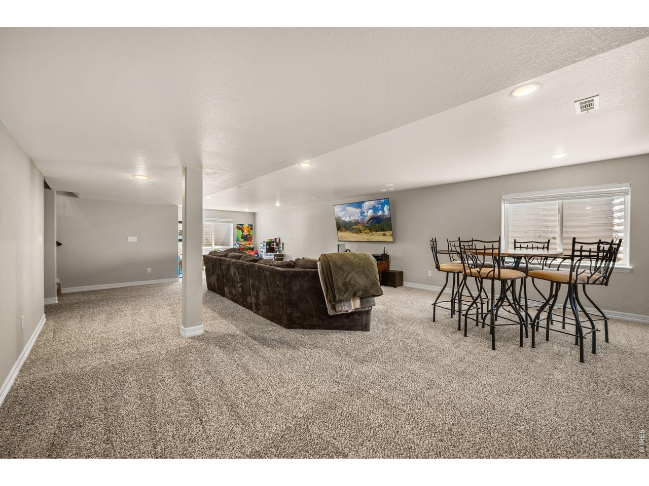 Property Photo 24 Lots of room to play or entertain in the basement family room