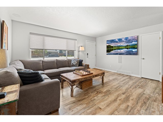 Property Photo 5 Fresh interior paint over beautiful laminate flooring.