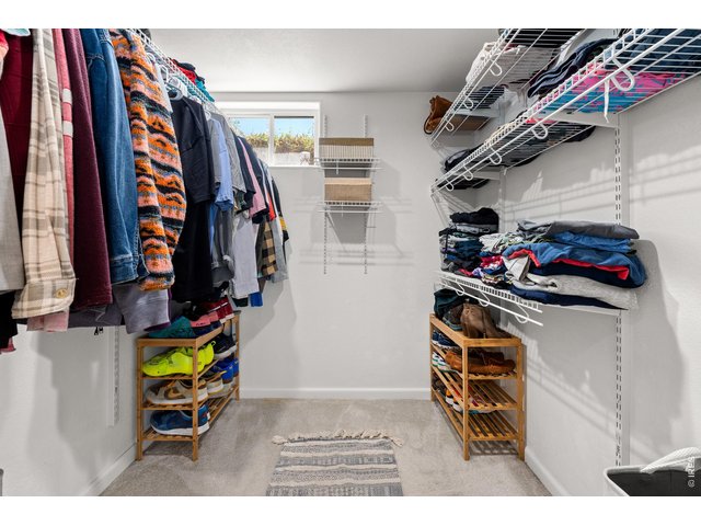 Property Photo 27 Well designed walk in closet.