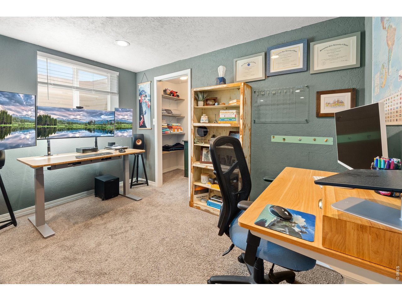 Property Photo 25 Part of family room is currently a home office. Nice egress window for a future 5th bedroom.