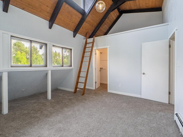 Property Photo 26 Primary bedroom with loft