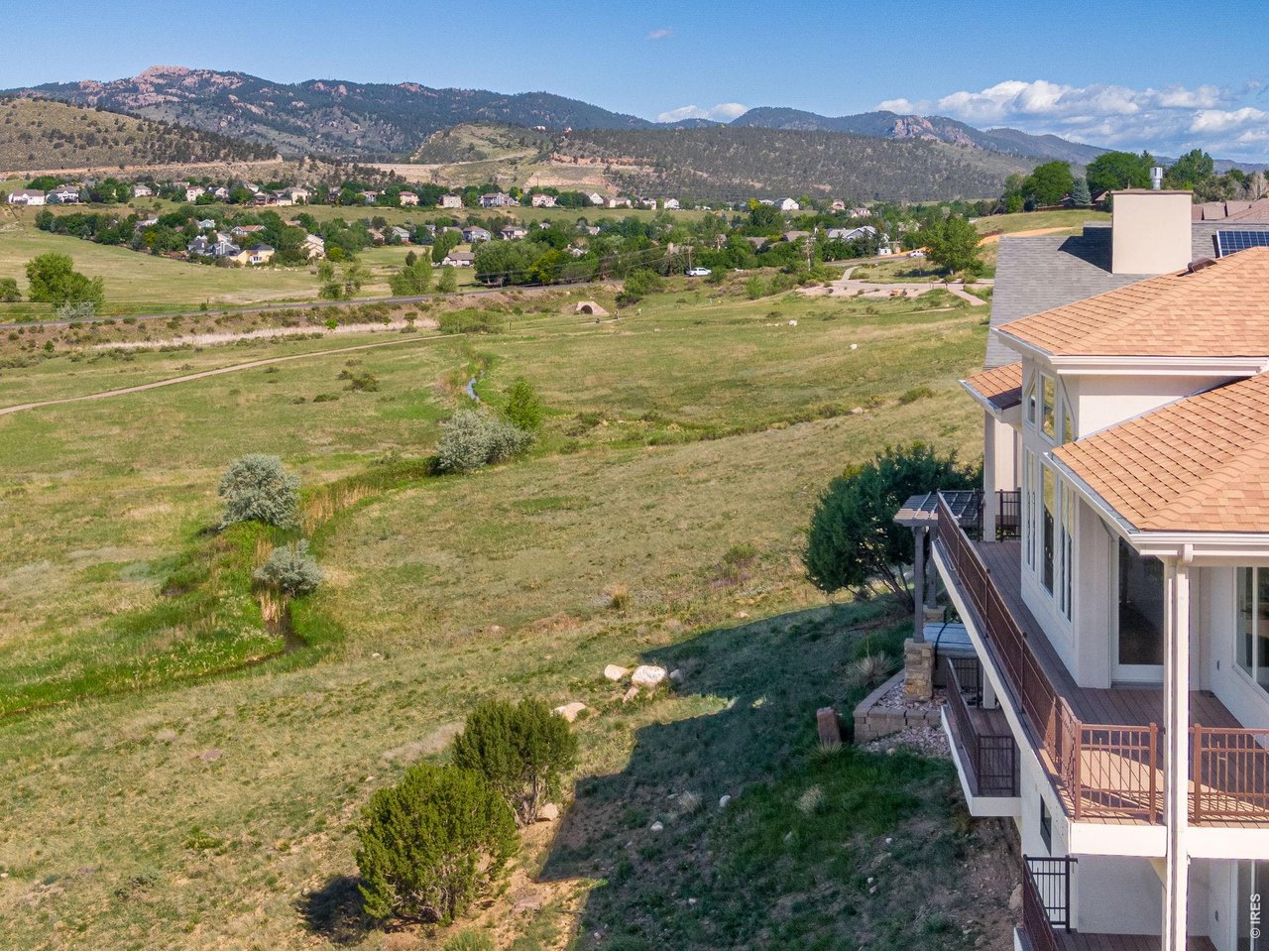 Property Photo 13 Low-Maintenance Luxury Lifestyle Property, Prepare to be blow-away by these views, as far as the eye can see panoramic unobstructed Foothill + Prairie Views, backing to the Cathy Fromme, a nature lover's paradise!