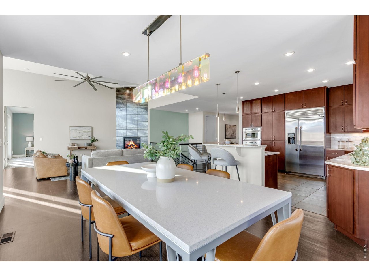 Property Photo 19 Included dining room table custom made just for this incredible space and matches the rails on the floating stairs!