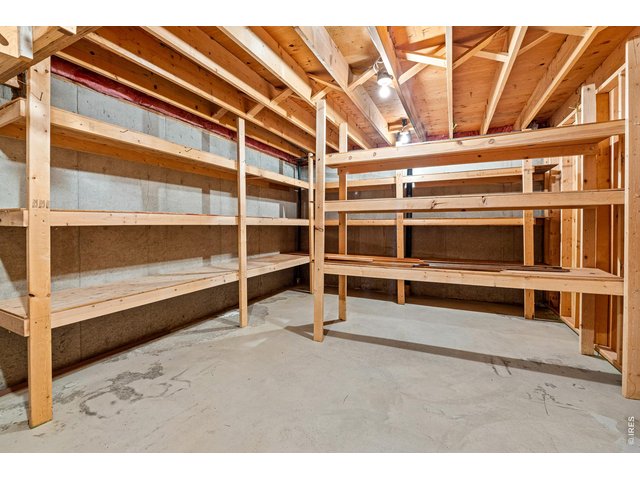 Property Photo 36 Storage room with lots of shelving