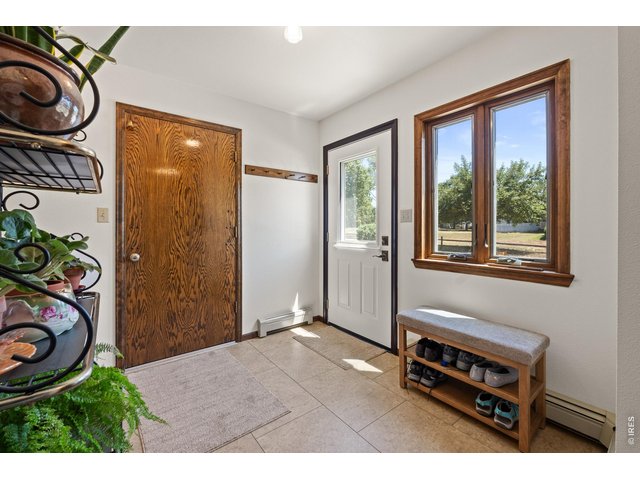 Property Photo 18 Side door entry and garage entry space