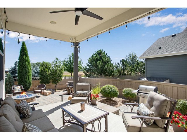Property Photo 7 Covered Backyard Patio - no homes behind! Full irrigation and drip lines