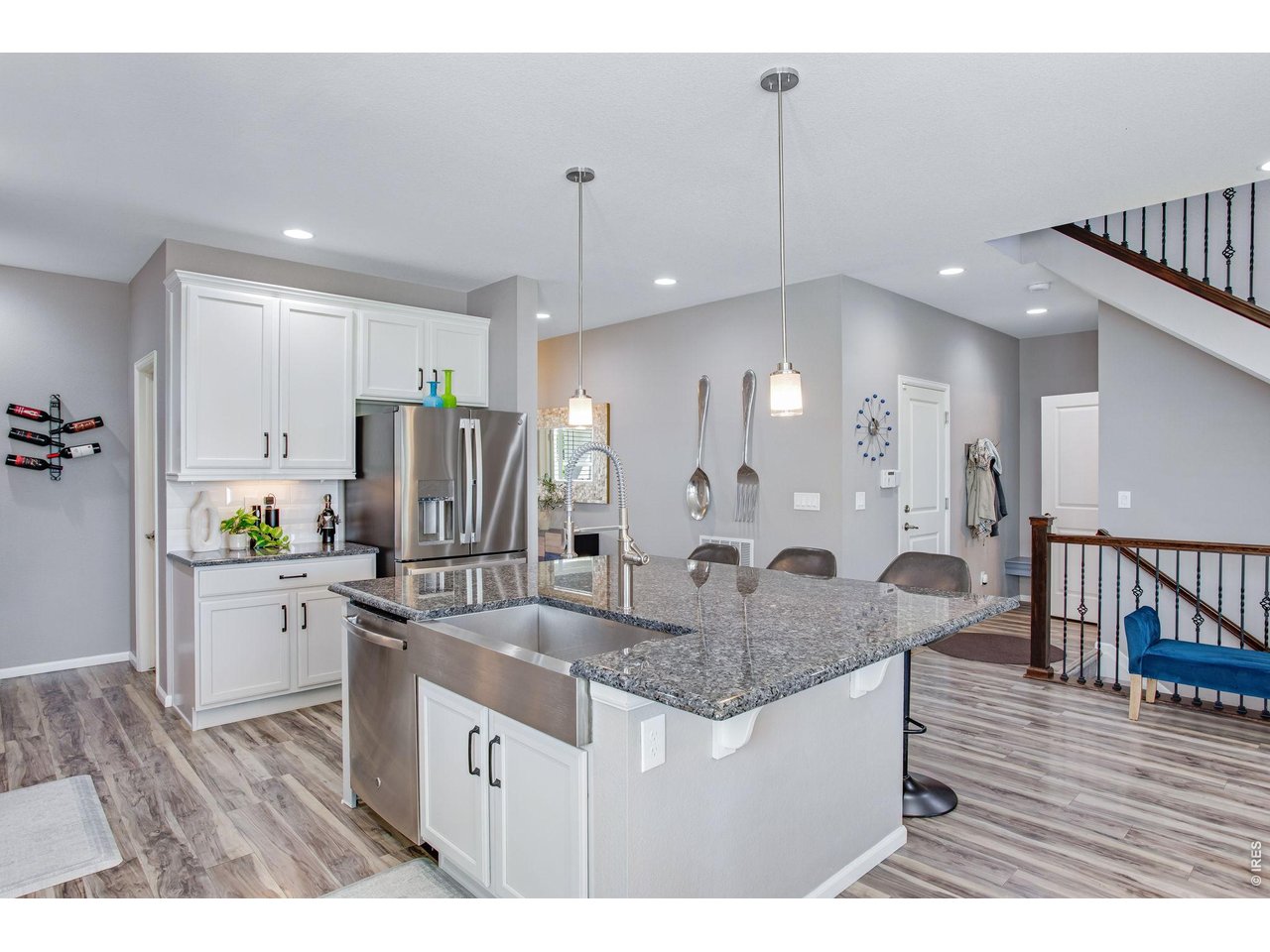 Property Photo 11 Stunning Stainless appliances, newer french door fridge 2025! Loaded with cabinetry & countertop space. Full tile splash!