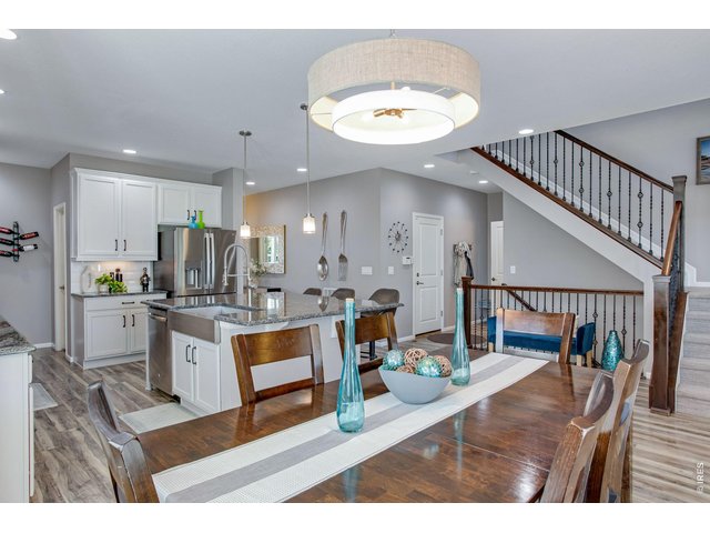 Property Photo 22 Open Dining looking into the kitchen, wrought-iron rails. All newer carpet/Plush High End Wool - Kennedy Point!