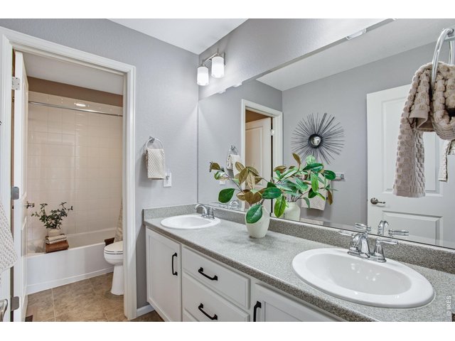 Property Photo 39 In pristine condition, lightly lived in - secondary bathroom - dual vanities and separate shower and toilet area.
