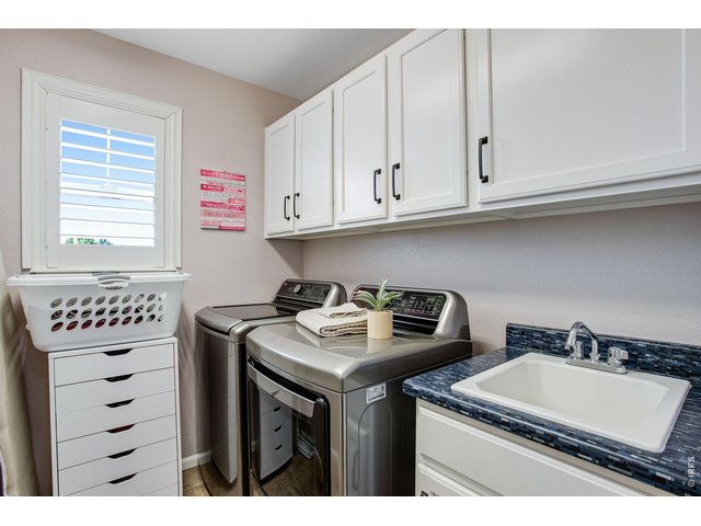 Property Photo 47 Upper level laundry, comes with both sets of washer/dryer! These upstairs are newer LGs 2025~