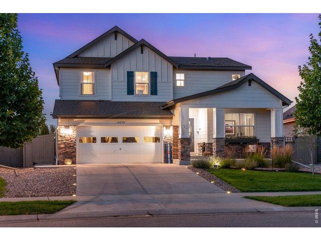 Property Photo 1 Exquisite McClellands Creek Sanctuary, nestled on a prime south facing lot framed with Open Space across the street and directly behind, 4038 Wild Elm Way, in south Fort Collins, is an entertainer's dream!