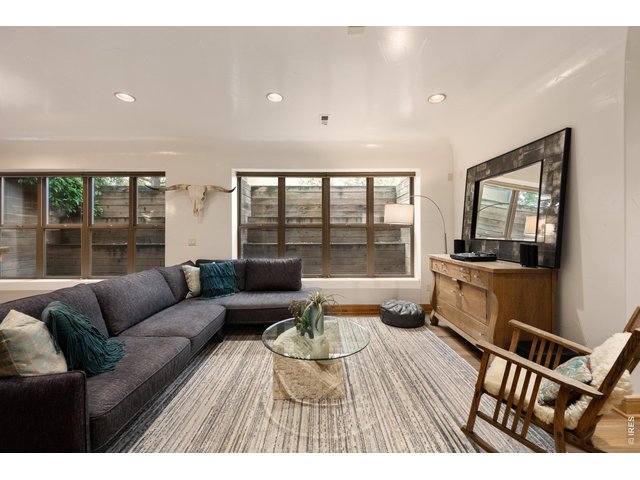 Property Photo 26 Basement Rec Room with Beautiful Garden Level Windows