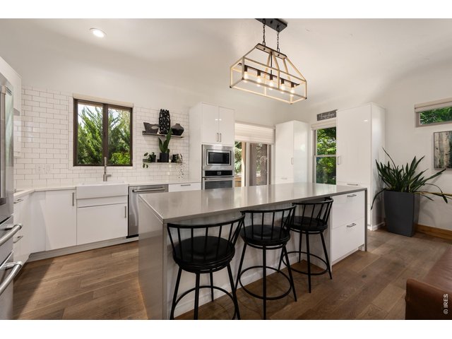 Property Photo 9 Huge Center Island with Waterfall Quartz Countertops!