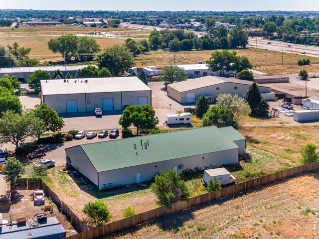 Property Photo 12 Rear of property looking east. Mulberry St. is in the background. Property is less than 2 miles to I-25