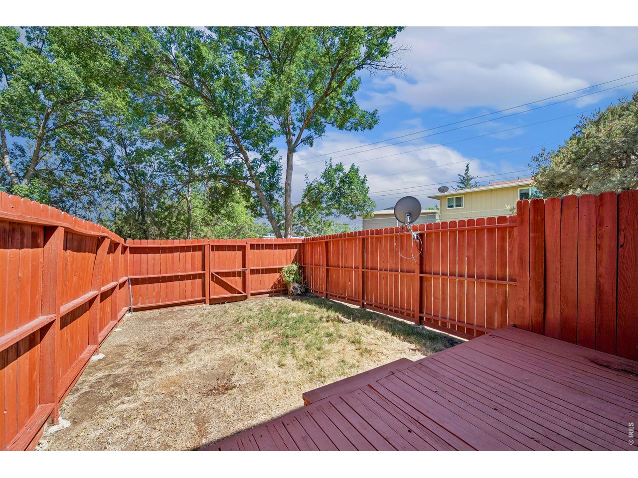 Property Photo 5 Small yard with sprinkler system
