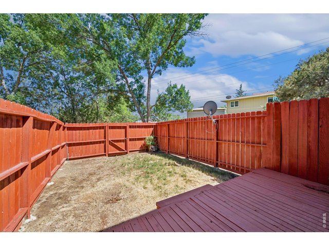 Property Photo 5 Small yard with sprinkler system