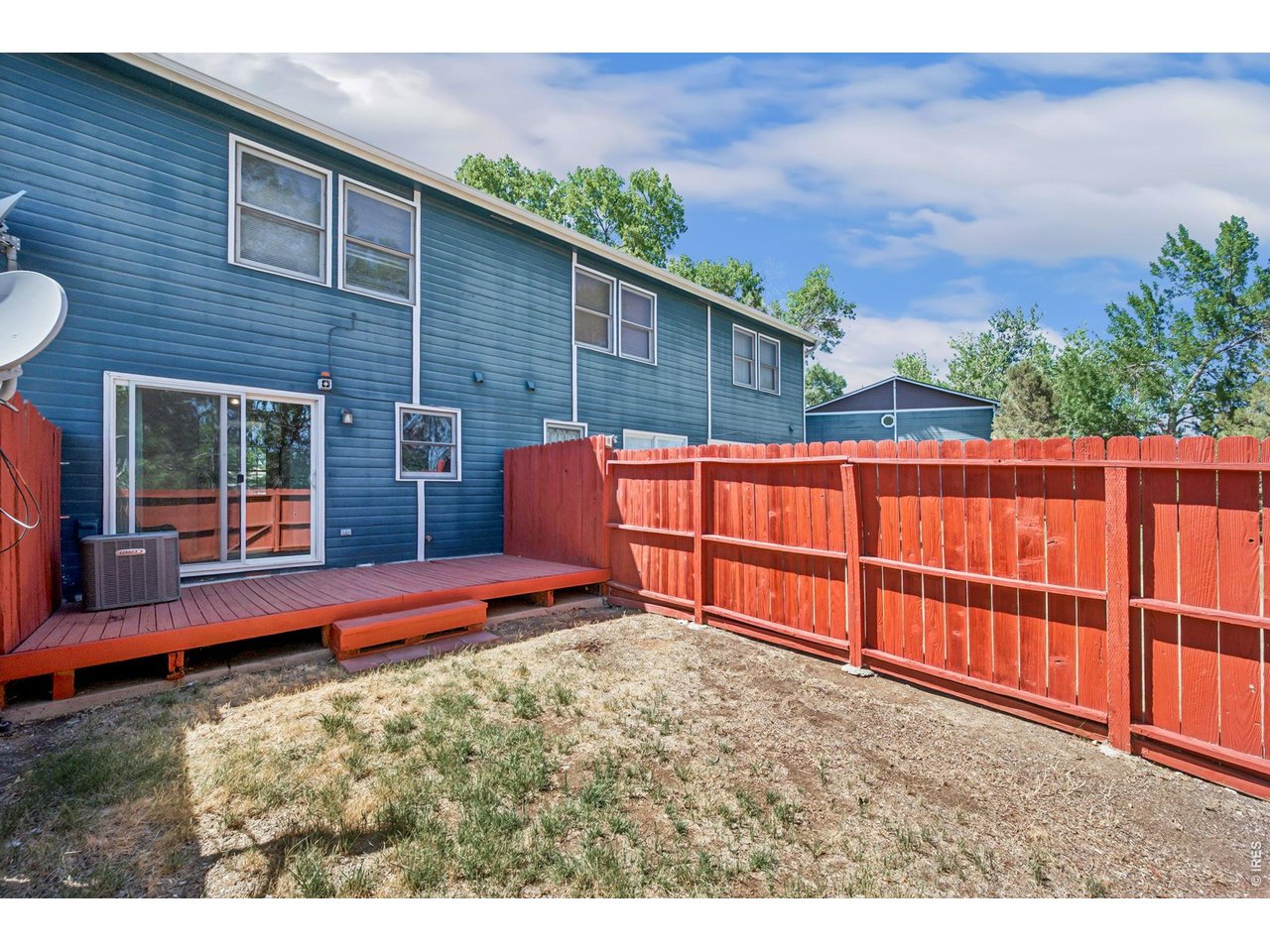 Property Photo 4 Large deck in back yard