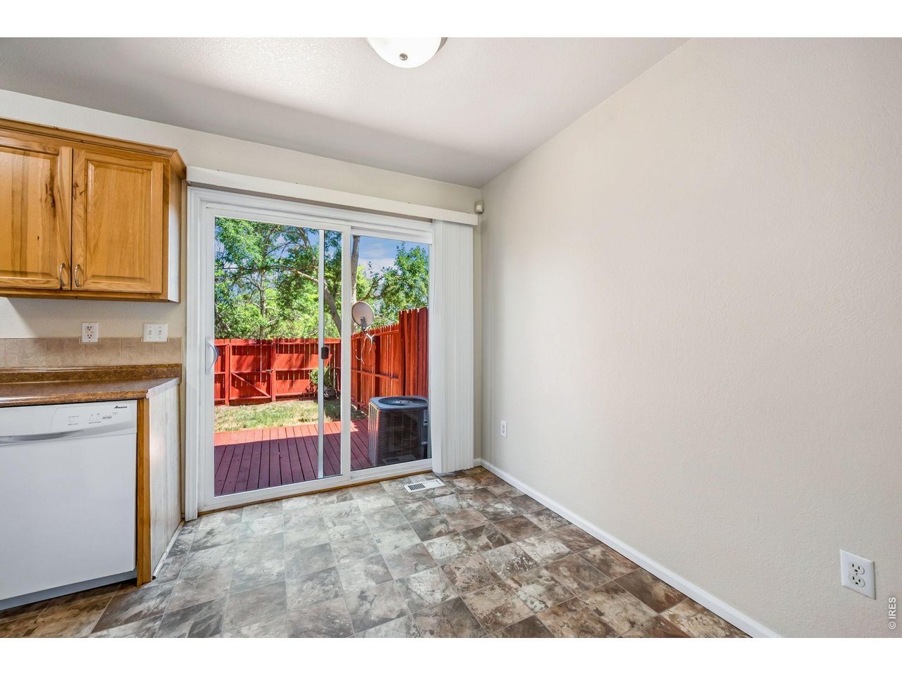 Property Photo 14 Eat-in kitchen with slider to back yard