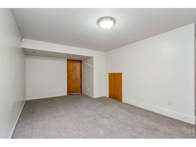 Property Photo 22 Basement family room has extra storage