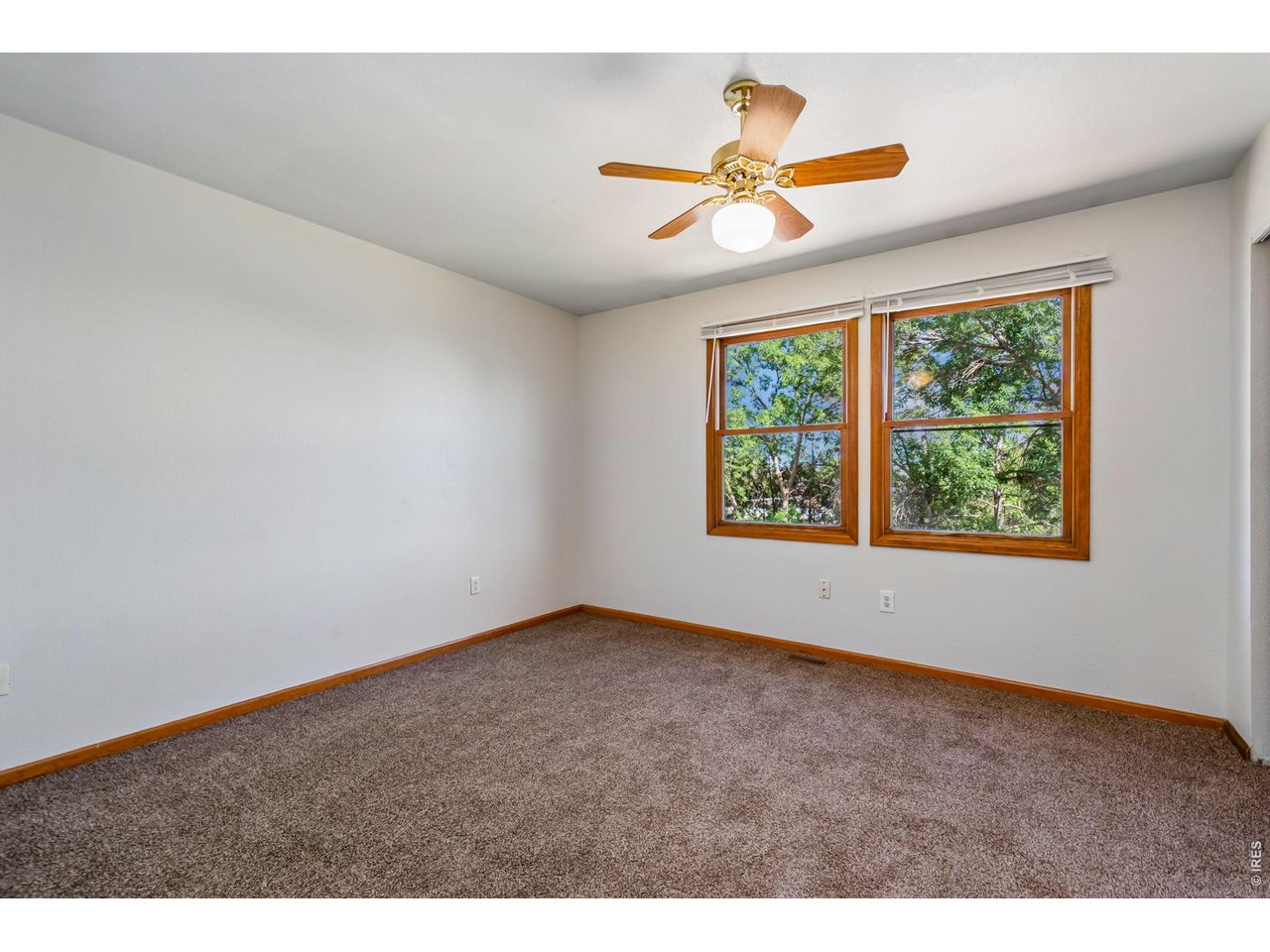 Property Photo 19 2nd bedroom has great light