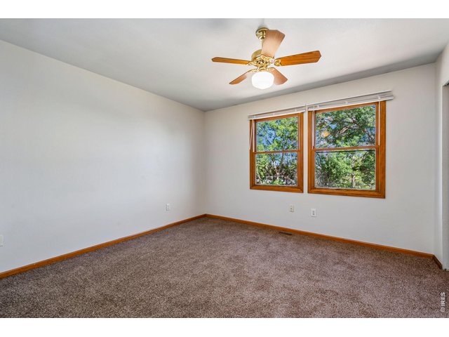 Property Photo 19 2nd bedroom has great light