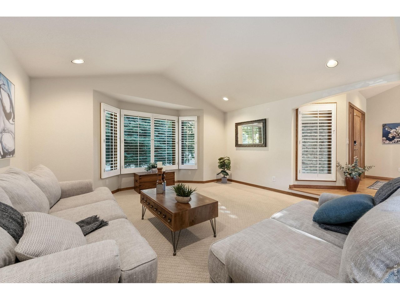 Property Photo 5 Beyond the foyer, the formal living and dining room offers an elegant space to entertain family and friends.