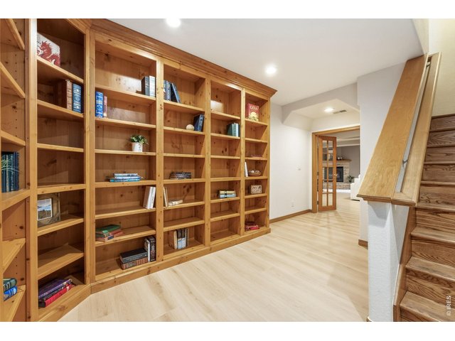 Property Photo 42 A book lover's dream floor-to-ceiling custom shelving.