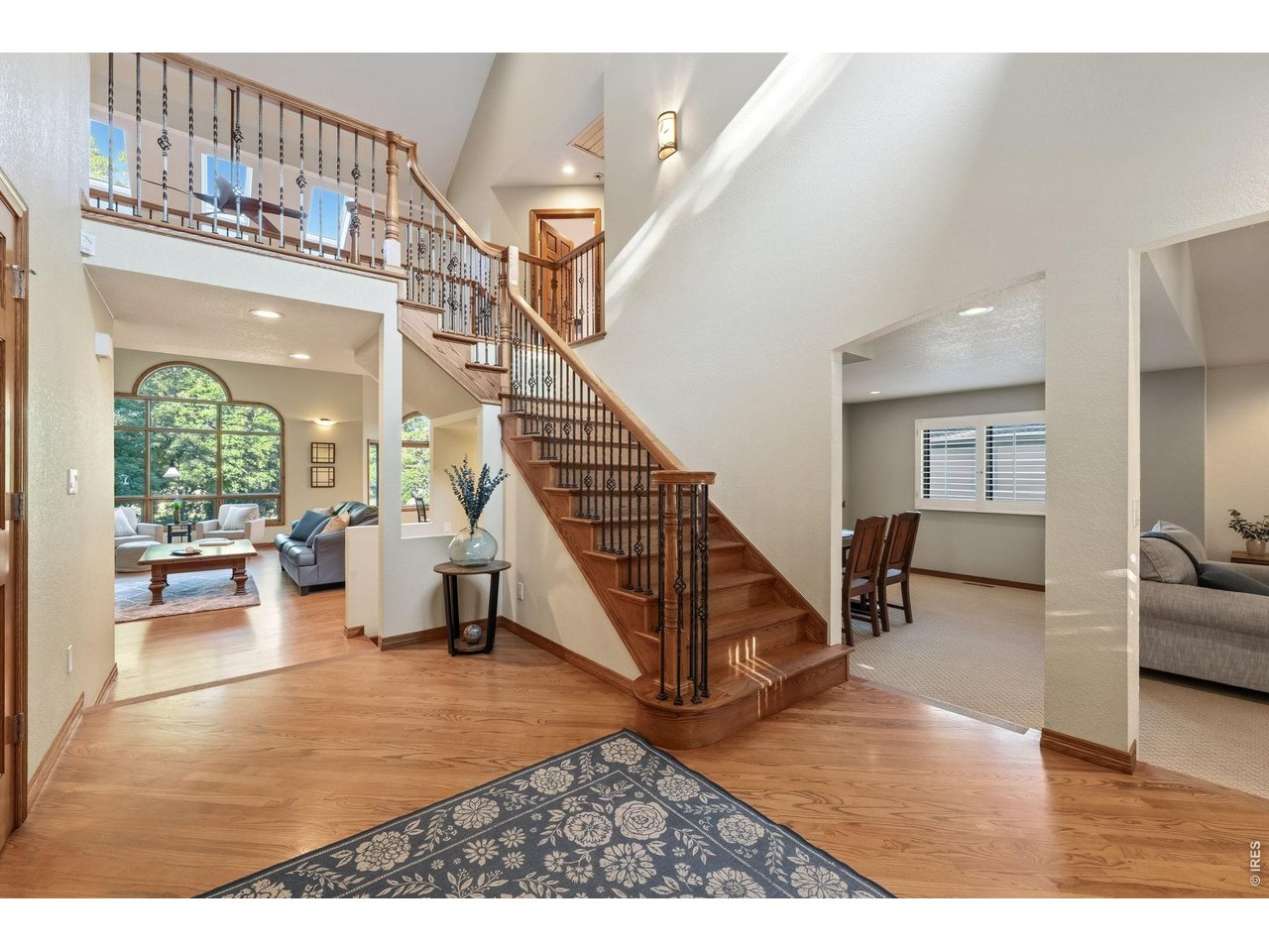 Property Photo 10 The beautiful wrought-iron staircase makes a statement from the moment you walk in