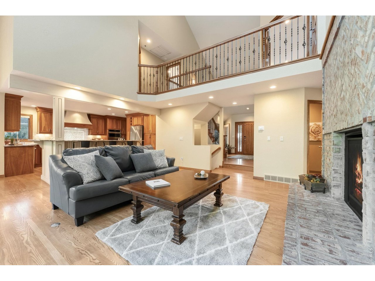 Property Photo 9 Dramatic vaulted ceilings and open loft overlook create an impressive gathering space