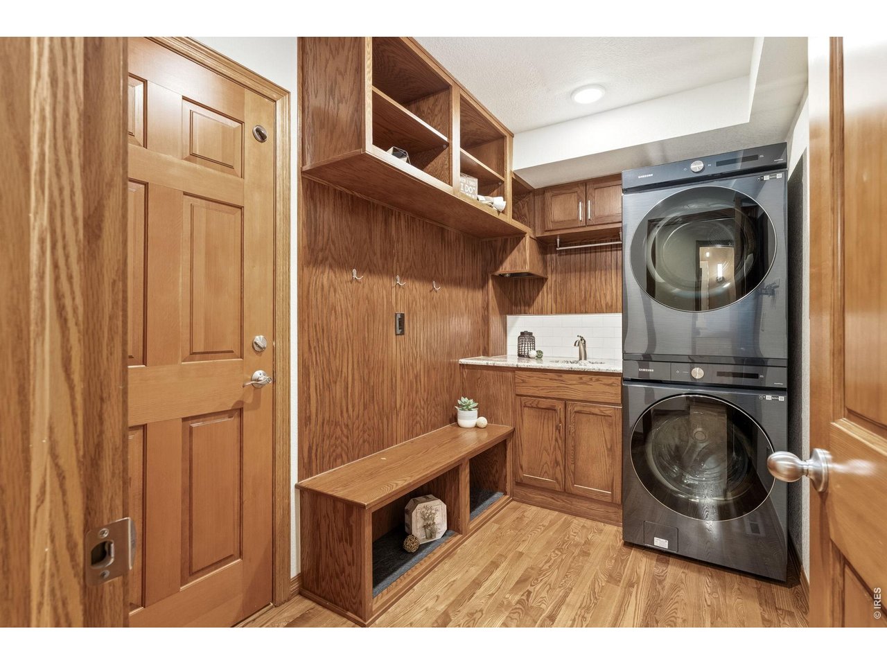 Property Photo 36 More than just a laundry room this functional space features a utility sink, built-in storage, and an organized drop zone.