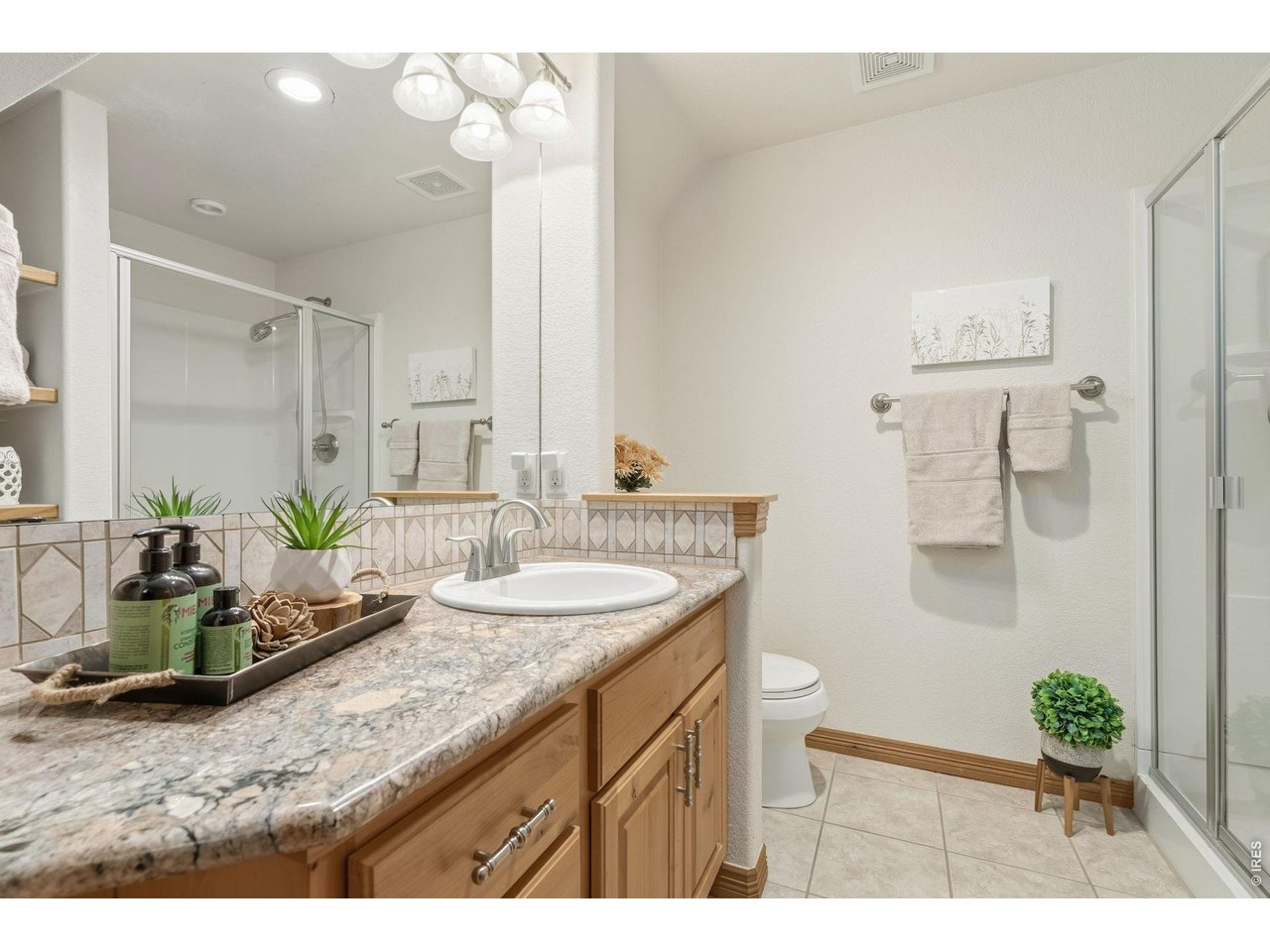 Property Photo 40 Beautifully finished with granite countertops and a walk-in shower.