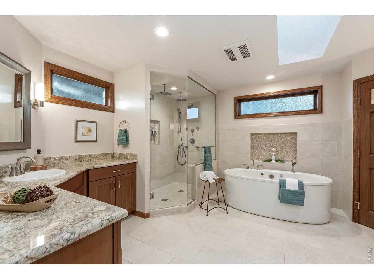 Property Photo 24 This spa inspired primary bathroom has it all!