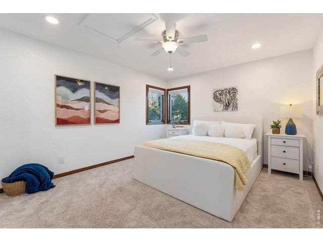 Property Photo 28 Comfortable and spacious, this secondary bedroom offers peaceful views and abundant natural light.