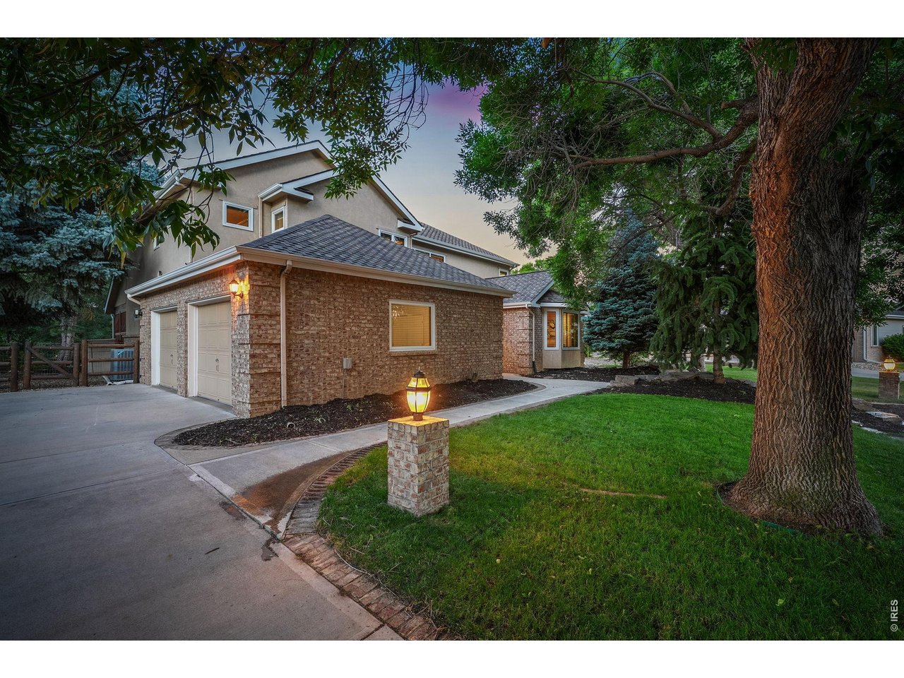 Property Photo 43 Thoughtful design continues outside with a spacious side-load garage.