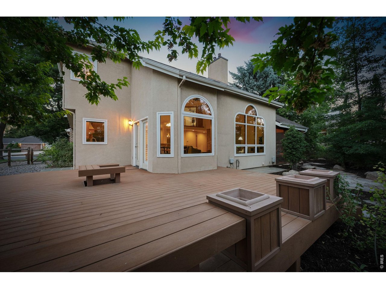 Property Photo 44 An expansive deck offers the perfect setting for entertaining or enjoying peaceful Colorado evenings.