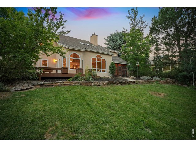 Property Photo 47 From the expansive deck to the lush lawn, every inch of this backyard is designed to be enjoyed.
