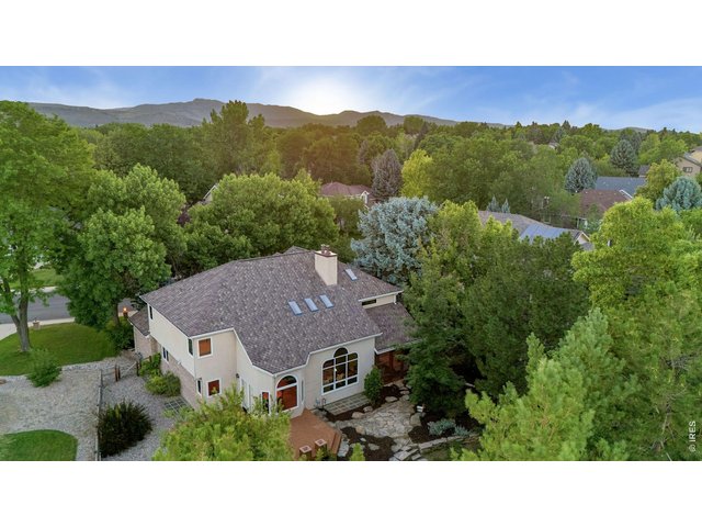 Property Photo 48 Nestled among mature trees, this exceptional property offers privacy in one of Fort Collins' most established neighborhoods.