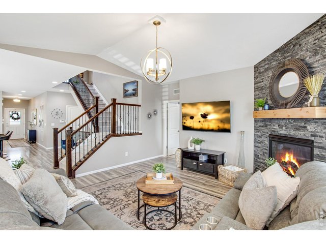 Property Photo 17 Main living living area, cozy gas fireplace with vaulted ceilings!