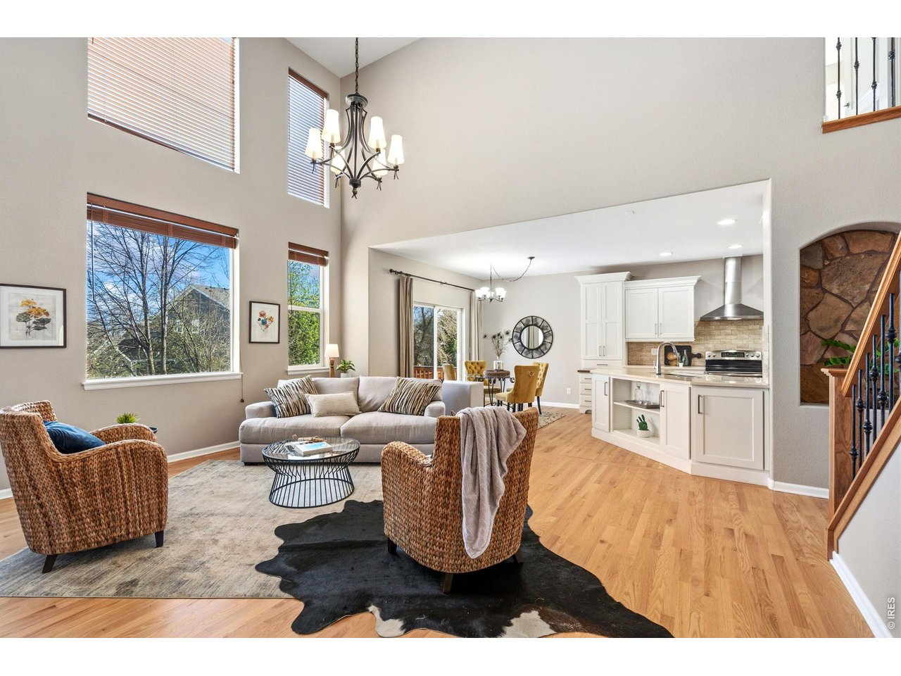 Property Photo 8 High ceilings with east morning light on the back of the home.