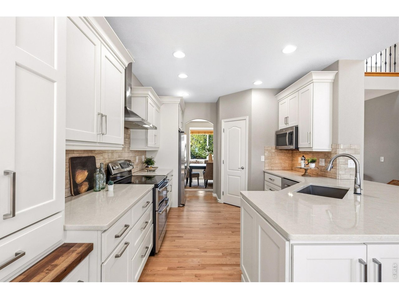 Property Photo 14 Quality Schroll cabinetry and quartz countertops.
