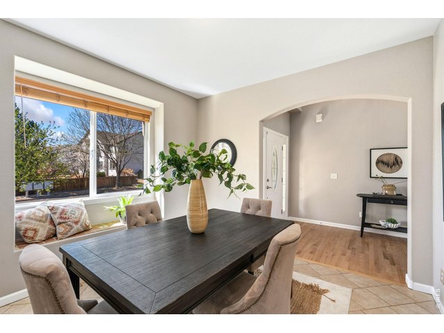 Property Photo 17 Formal dining room off entry with window seat.