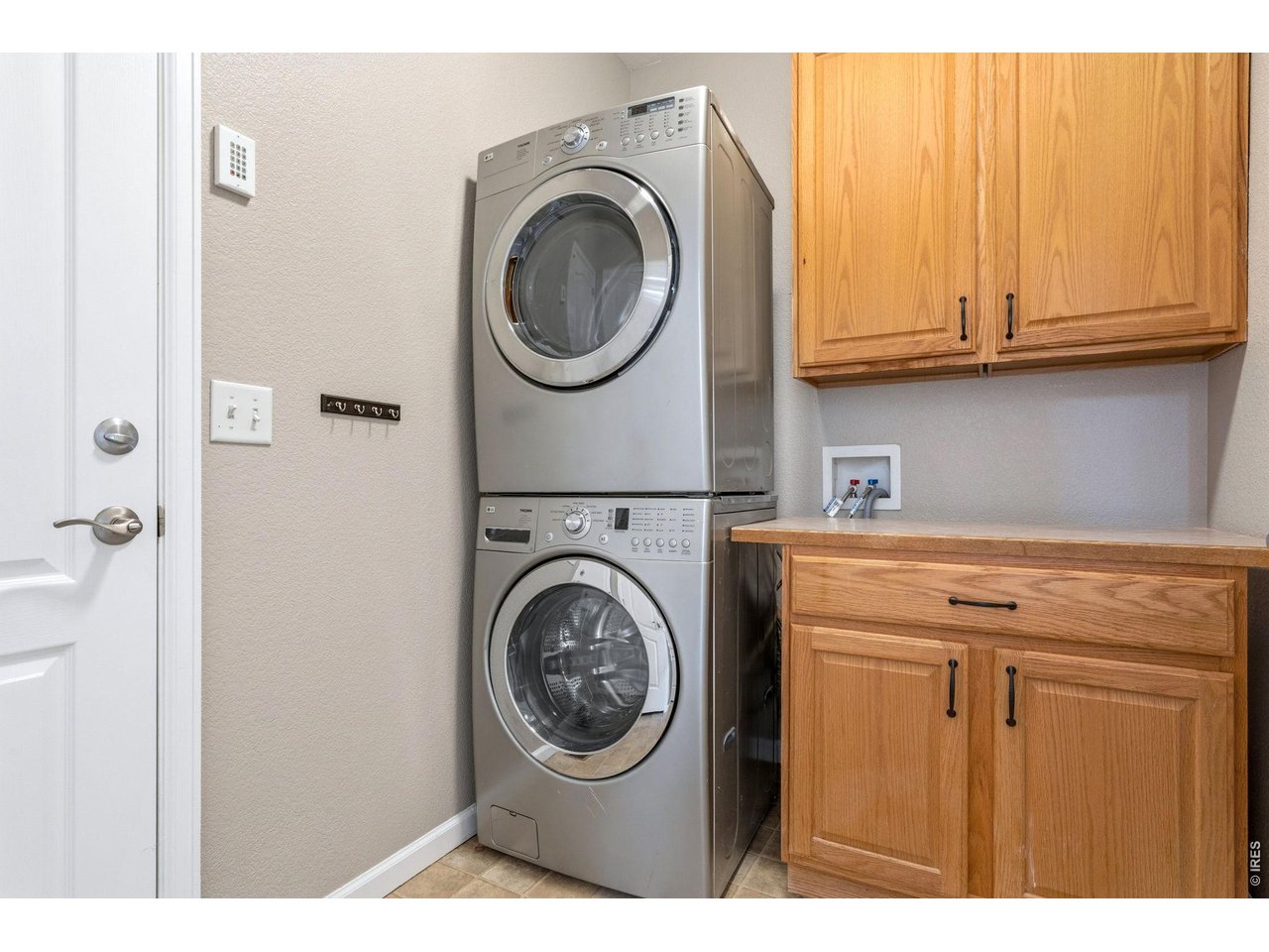 Property Photo 44 Main floor laundry & mud room with access to the 3 car garage.