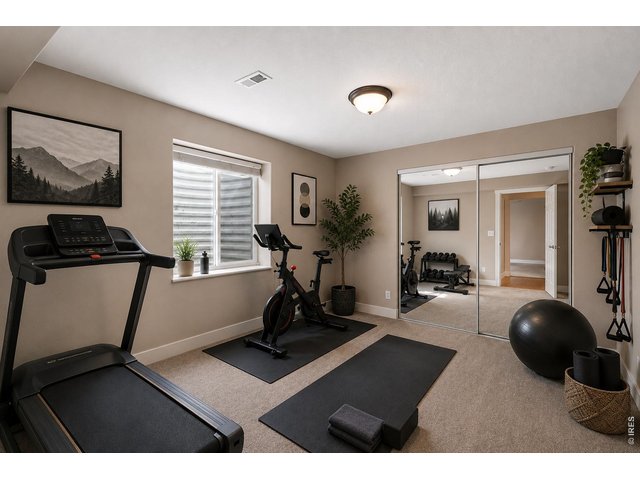 Property Photo 39 VIRTUALLY STAGED-basement gym/exercise room.