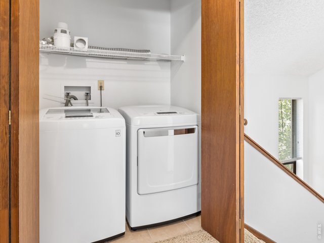 Property Photo 19 Laundry closet upper level