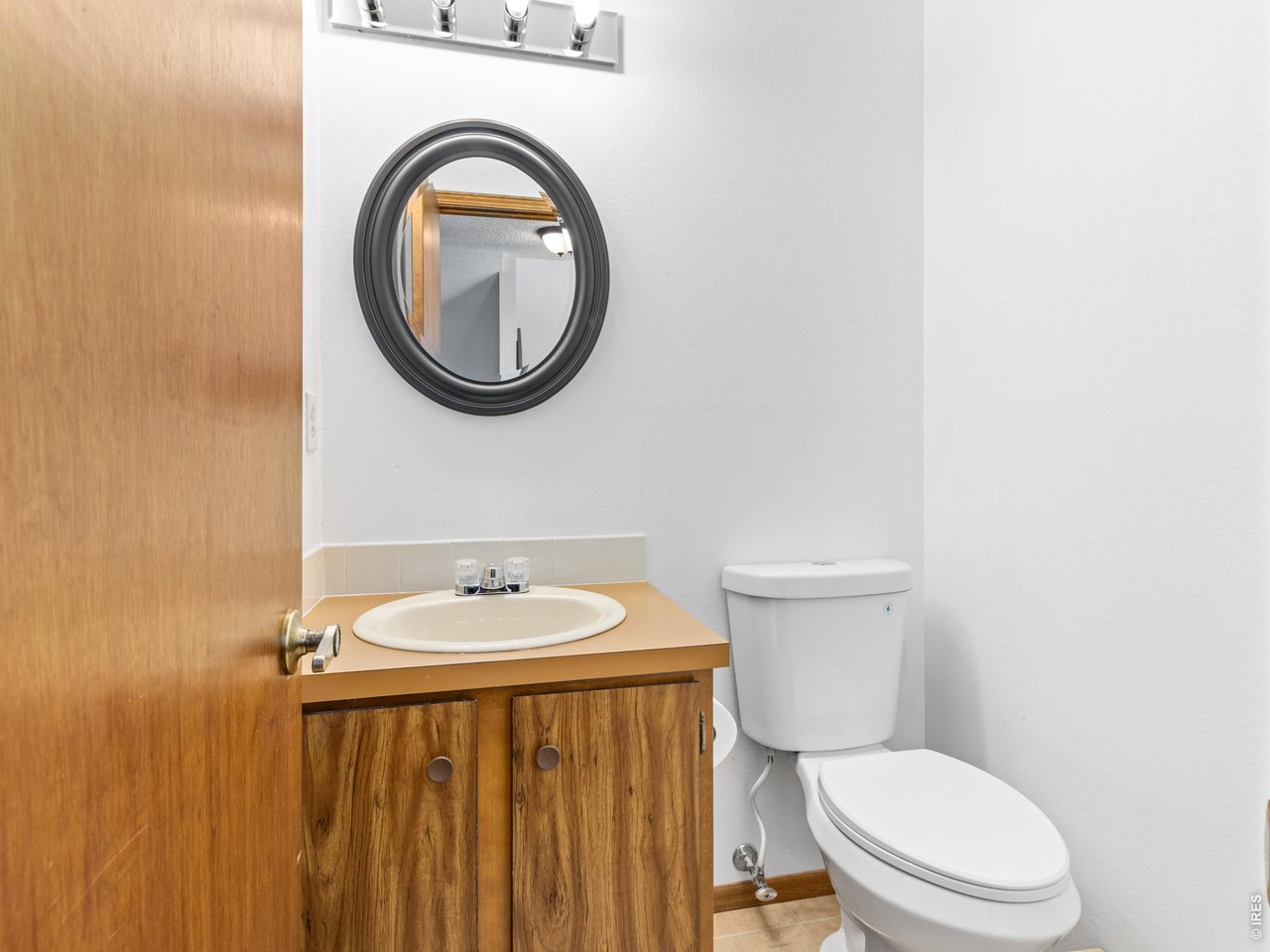 Property Photo 10 A convenient half bath on the main level completes the thoughtfully designed floor plan