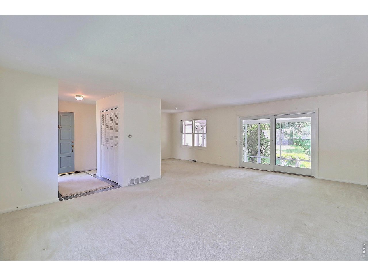 Property Photo 6 Open Floor Plan of the Living Room and Dining Room