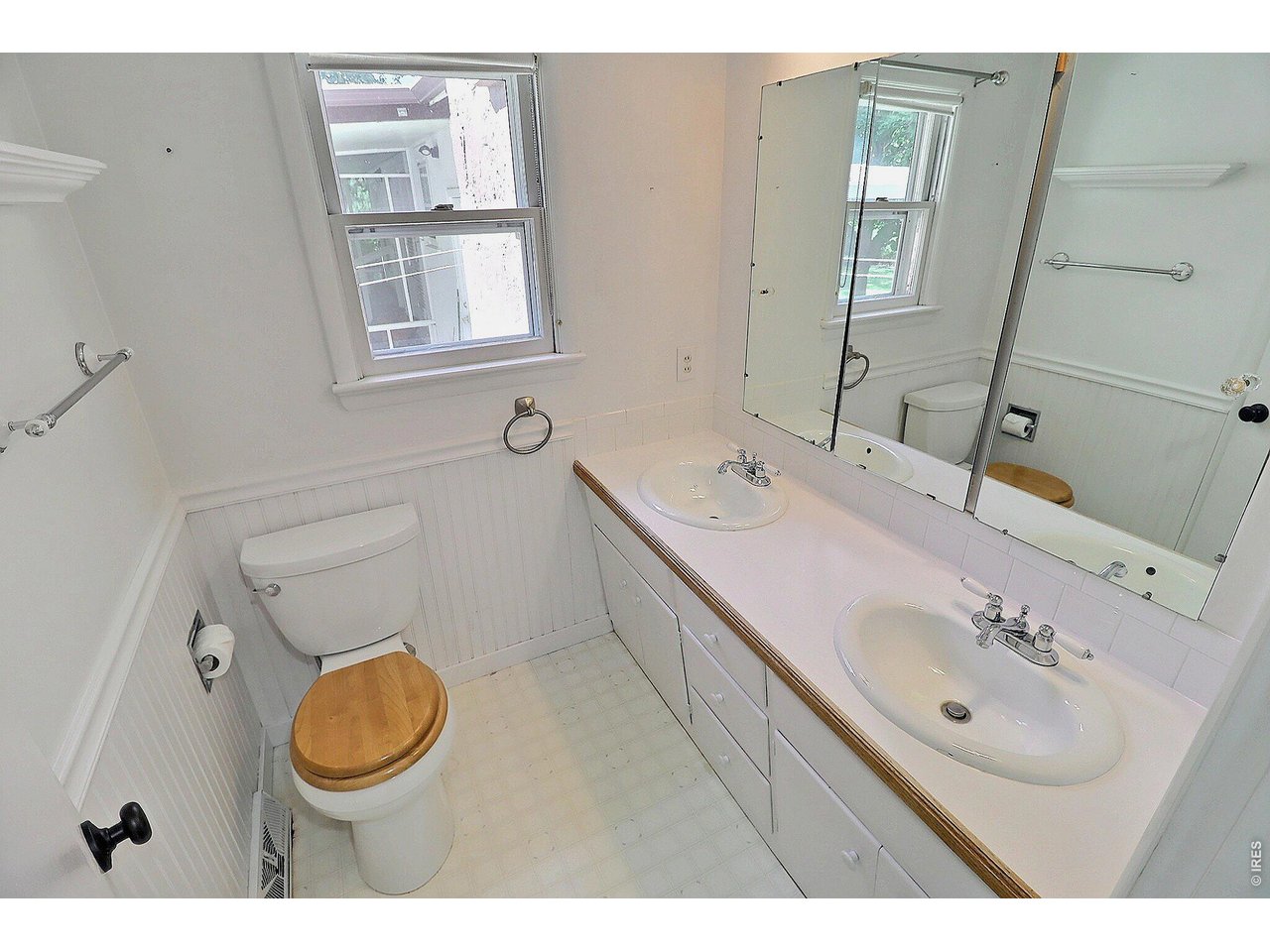 Property Photo 23 Main Bathroom with Dual Sink Vanity