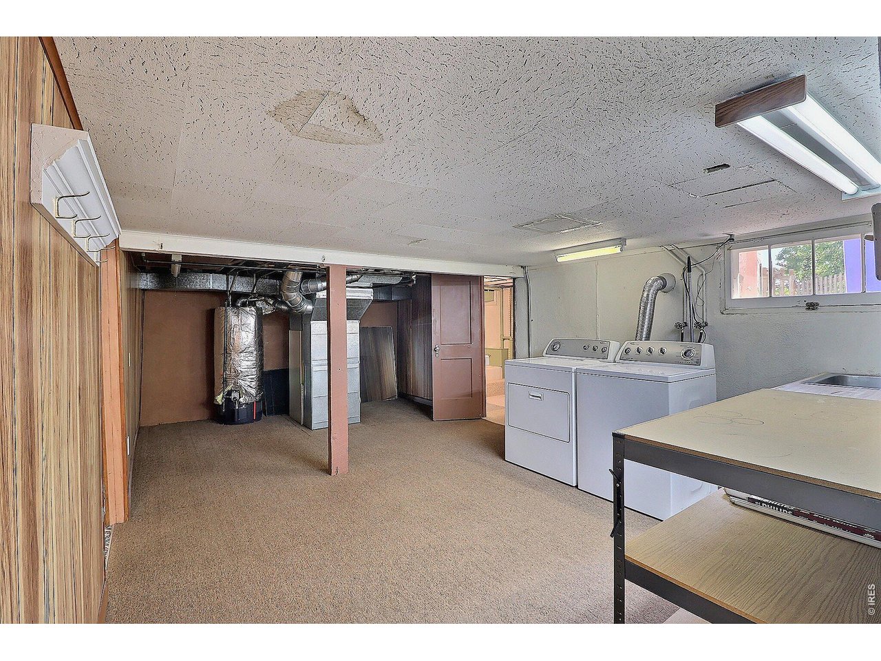 Property Photo 30 Downstairs Laundry Room and Storage